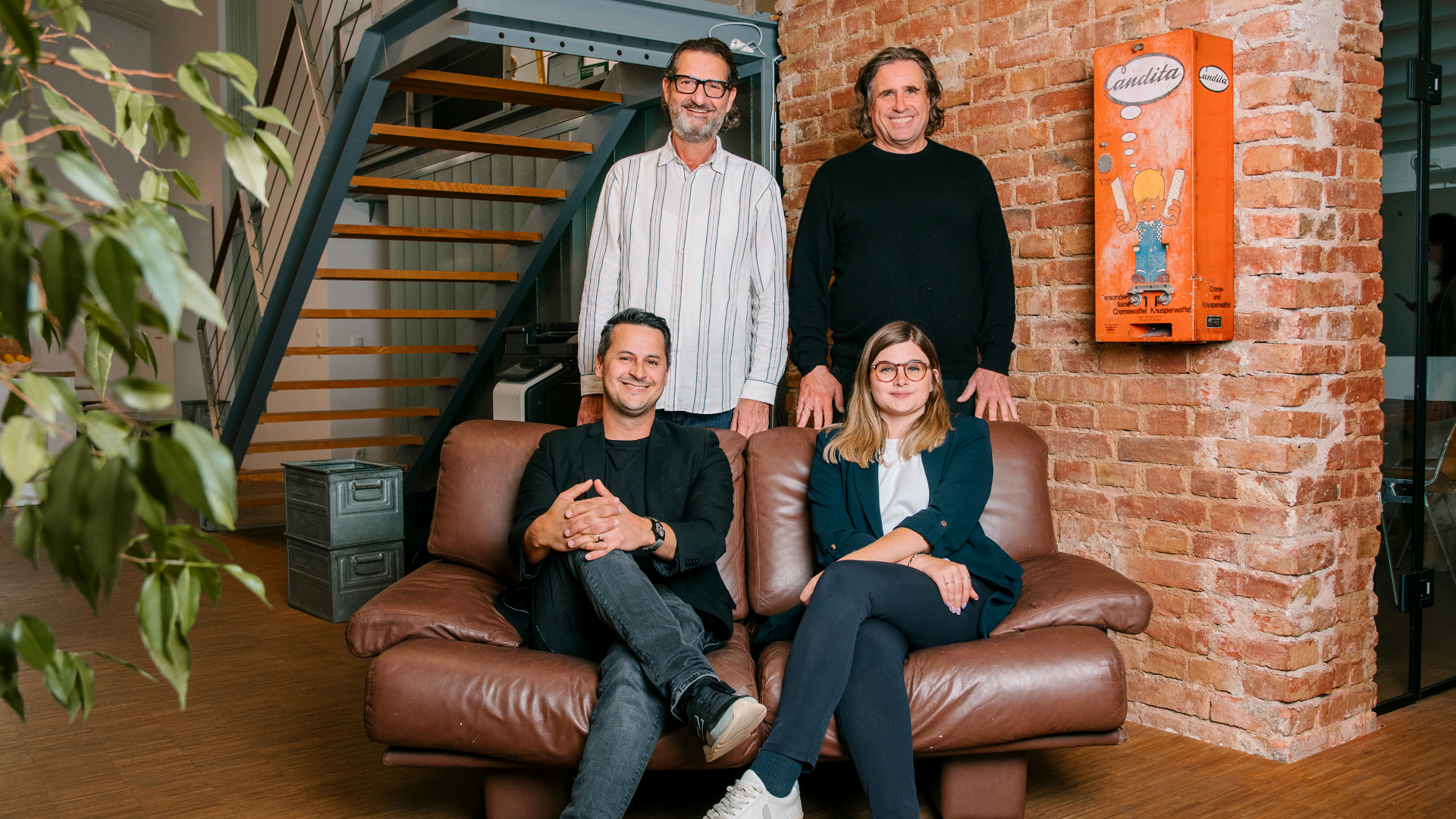Gruppenfoto mit vier Partnern von M+K Wien